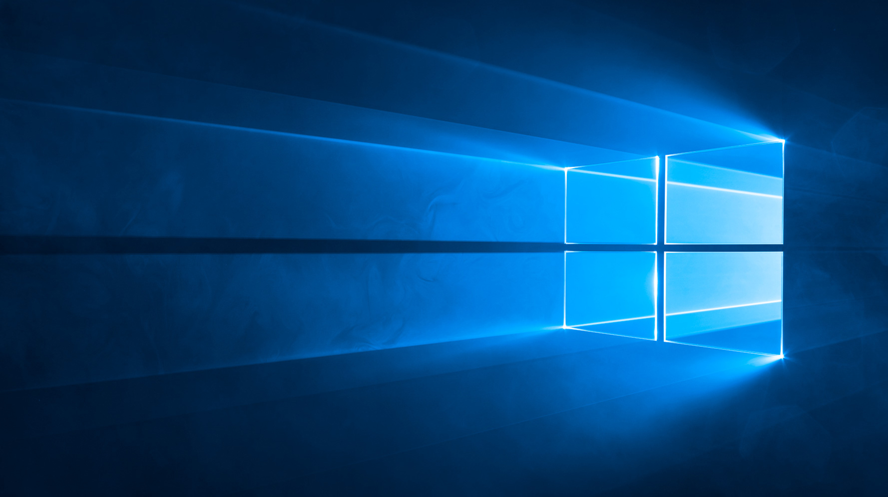 Xem Microsoft chụp hình nền mới của Windows 10 với logo được chiếu sáng  theo kiểu Tron Legacy